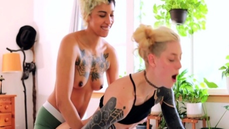 Tattooed masc dykes take turns strapon fucking each other